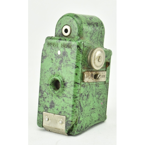 161 - A mid 20th century circa 1934 Coronet Midget 16mm miniature spy camera. The camera in marble green. ... 