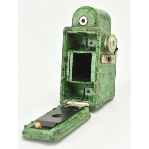 161 - A mid 20th century circa 1934 Coronet Midget 16mm miniature spy camera. The camera in marble green. ... 