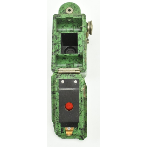 161 - A mid 20th century circa 1934 Coronet Midget 16mm miniature spy camera. The camera in marble green. ... 