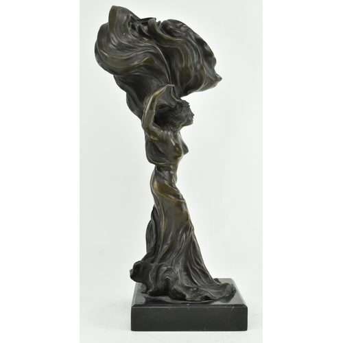 175 - After Agathon Léonard, French (1841-1923) - A 20th century bronze worked sculpture of a lady with de... 