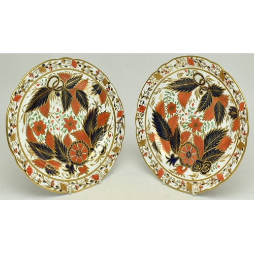 180 - A pair of 19th century c.1850 Spode Imari gilt frill plates. Each plate decorated with flowers and f... 