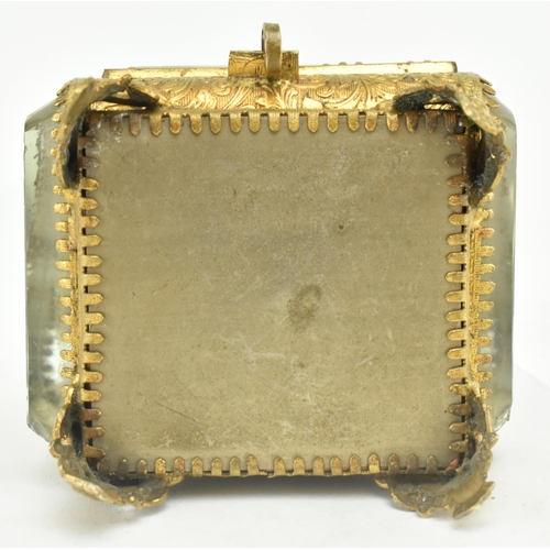 183 - A Victorian 19th century gilt metal & bevelled glass pocket watch casket case on feet. The casket wi... 