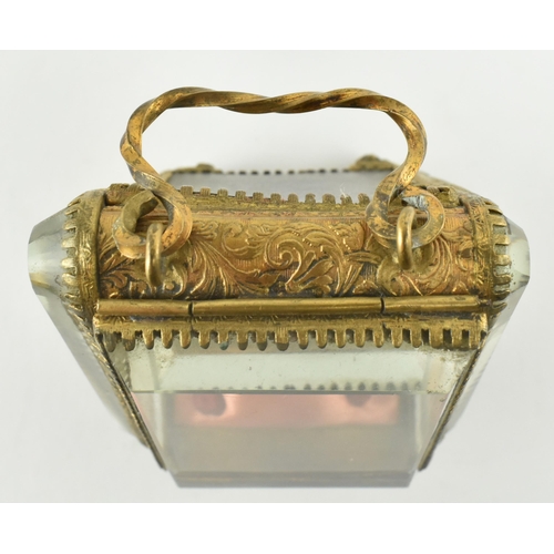 183 - A Victorian 19th century gilt metal & bevelled glass pocket watch casket case on feet. The casket wi... 