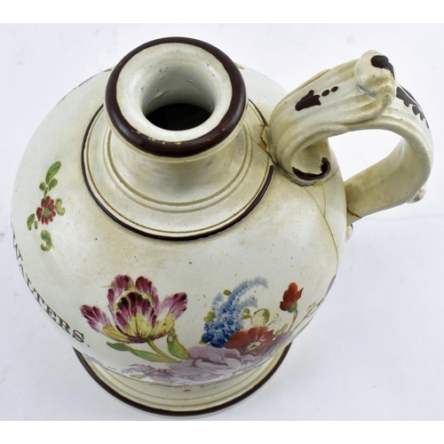 184 - A 19th century pearlware flagon cup with floral decorations. The flagon dated 1851 and bearing the n... 