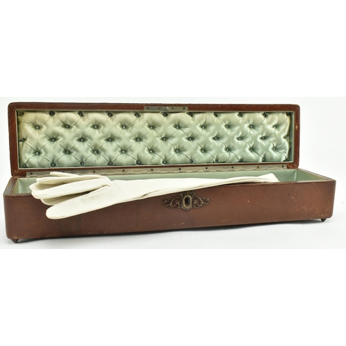 186 - A mid-late 19th century French leather glove box, complete with a later pair of Harrods London white... 