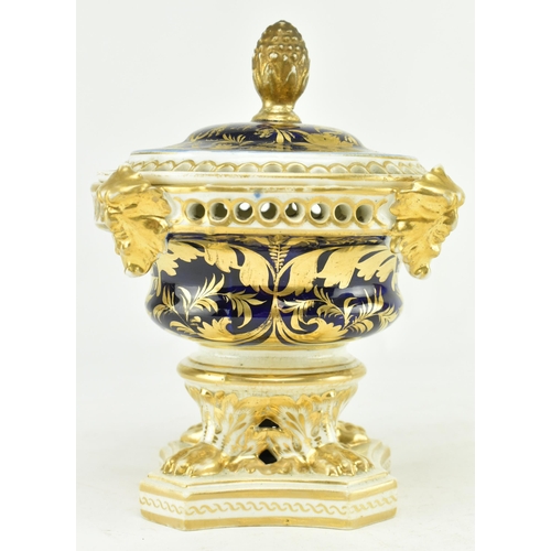 19 - Royal Crown Derby - An early 19th century 1806-1825 cobalt & gilt ceramic potpourri bowl on foot. Th... 