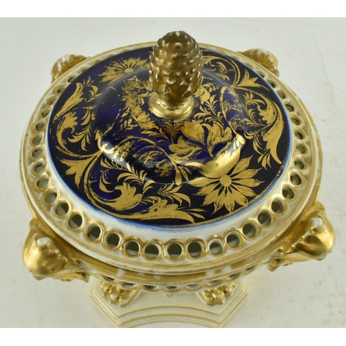 19 - Royal Crown Derby - An early 19th century 1806-1825 cobalt & gilt ceramic potpourri bowl on foot. Th... 