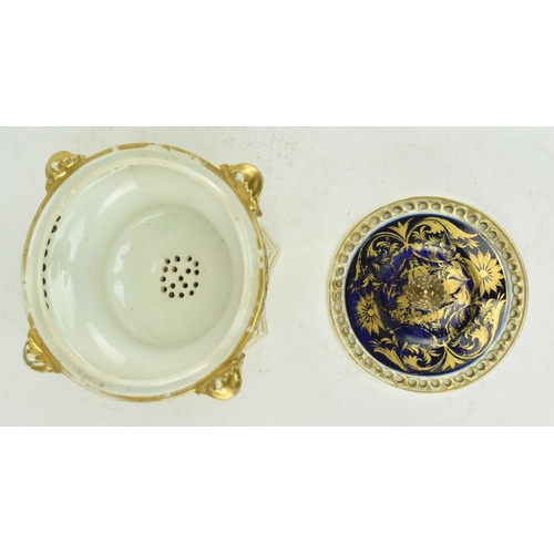 19 - Royal Crown Derby - An early 19th century 1806-1825 cobalt & gilt ceramic potpourri bowl on foot. Th... 