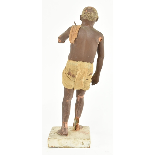 198 - A mid - late 19th century Indian Krishnanagar clay doll. The figure depicts a man with cloth clothin... 