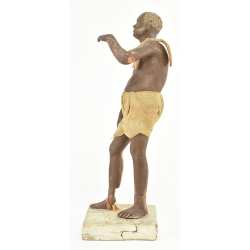 198 - A mid - late 19th century Indian Krishnanagar clay doll. The figure depicts a man with cloth clothin... 