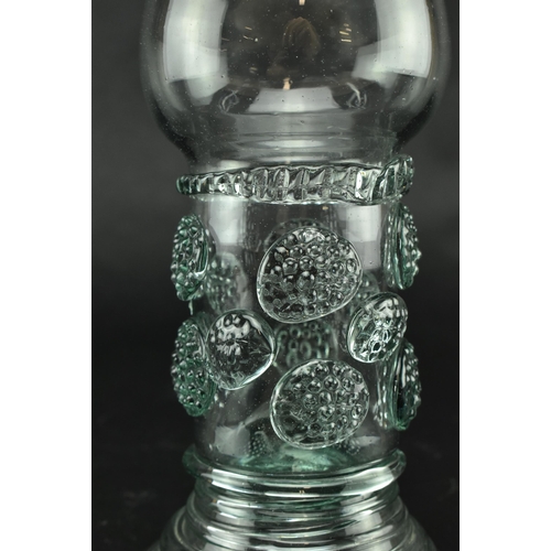 20 - An English George III 18th century hand blown lead glass Roemer. The glass having a cup incorporatin... 