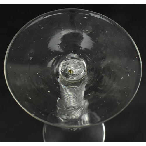 200 - An 18th century George III wine drinking glass having a bell shaped bowl with air twist stem raised ... 