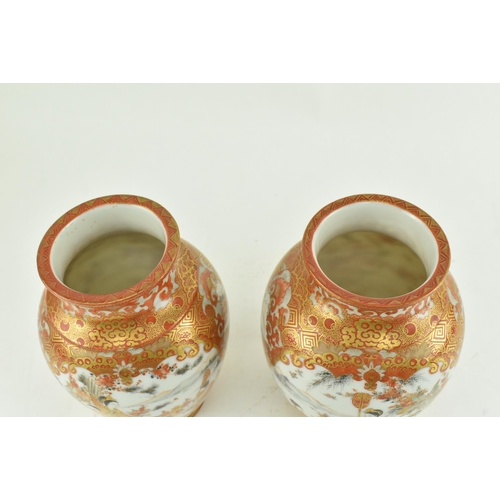 202 - A pair of mirror Japanese 20th century Kutani hand painted porcelain vases. Each vase with flared li... 