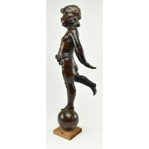 204 - A continental believed 19th century carved wood figure of cherub on globe. The cherub with arms swin... 