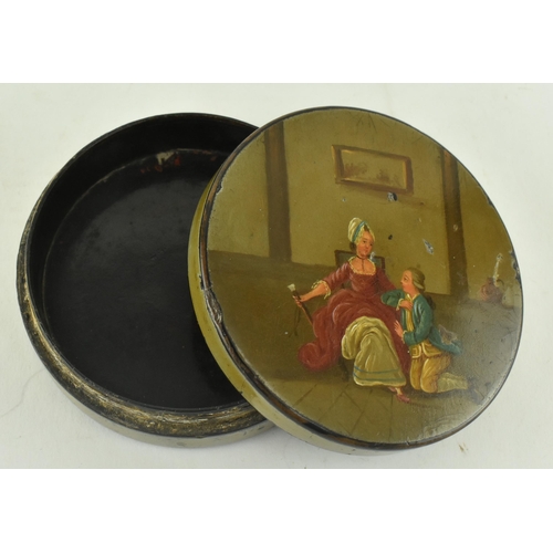 206 - A late 18th century Russian lacquered papier mache pill / snuff box. The box depicting a scene of a ... 