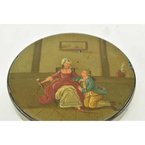 206 - A late 18th century Russian lacquered papier mache pill / snuff box. The box depicting a scene of a ... 