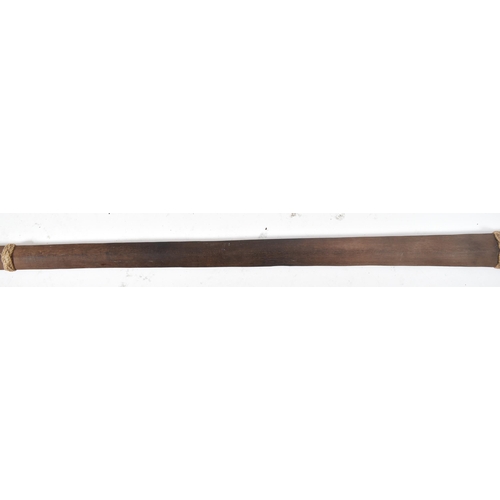 213 - A 19th century hardwood Solomon Island / Tonga / Polynesian paddle club of tapering elongated spatul... 