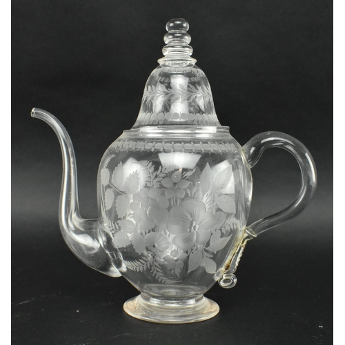 22 - A mid 19th century Victorian circa 1860 likely Stourbridge engraved glass teapot and cover. The teap... 