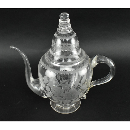 22 - A mid 19th century Victorian circa 1860 likely Stourbridge engraved glass teapot and cover. The teap... 