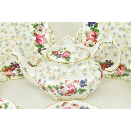 224 - Style of Staffordshire -  An early 20th century circa 1900 fine bone china porcelain twelve person t... 