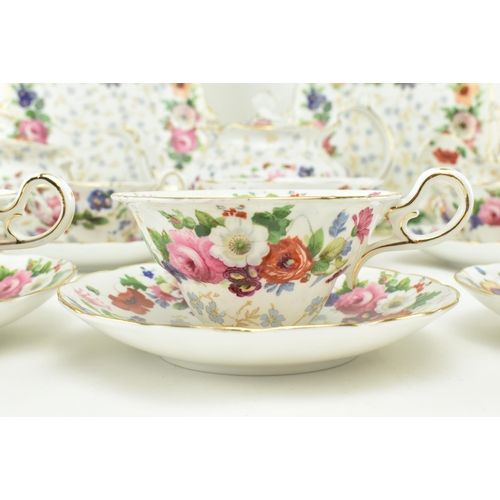 224 - Style of Staffordshire -  An early 20th century circa 1900 fine bone china porcelain twelve person t... 