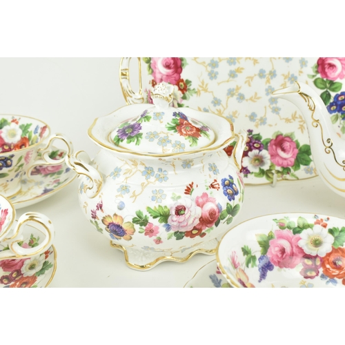 224 - Style of Staffordshire -  An early 20th century circa 1900 fine bone china porcelain twelve person t... 