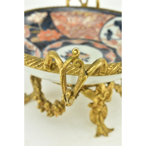 26 - A Japanese 19th century gilt ormolu mounted & ceramic hand painted Imari bowl. The bowl hand painted... 