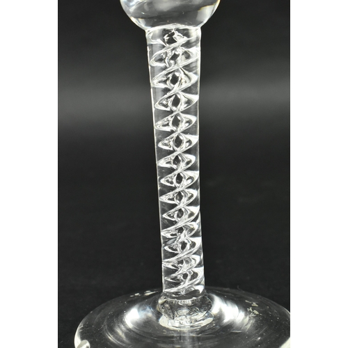 28 - A circa 1760 George III mercury twist wineglass. The glass featuring trumpet bowl over double mercur... 