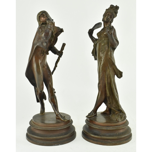 33 - A pair of circa 19th century bronzed spelter figures of courting couple. The lot comprising of a fig... 