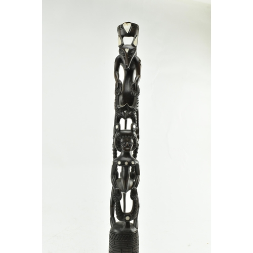 34 - A 20th century Polynesian, possibly Trobriand Islands, hardwood and inset mother of pearl totem pole... 