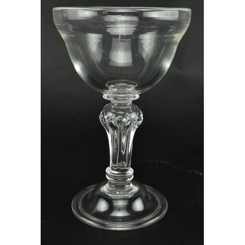 43 - A George III early 19th century hand blown sweetmeat glass. The sweetmeat having an ogee bowl over a... 