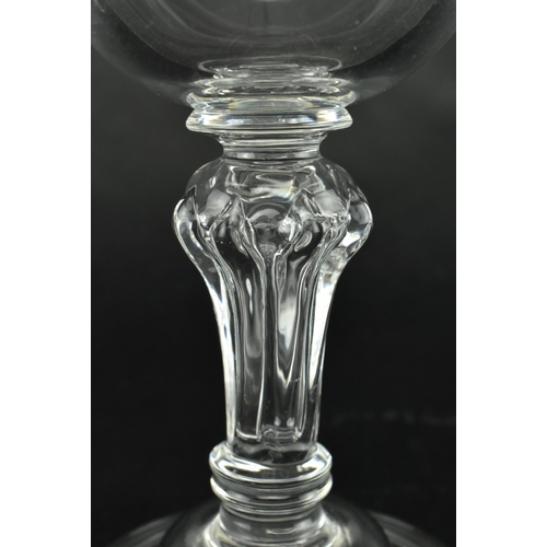 43 - A George III early 19th century hand blown sweetmeat glass. The sweetmeat having an ogee bowl over a... 