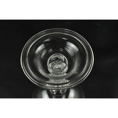 43 - A George III early 19th century hand blown sweetmeat glass. The sweetmeat having an ogee bowl over a... 