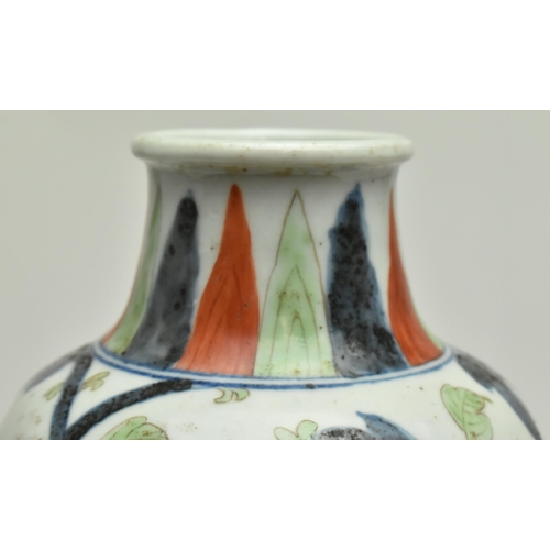 46 - An 18th century Chinese Qing dynasty ceramic wucai phoenix and peony baluster vase. The baluster vas... 