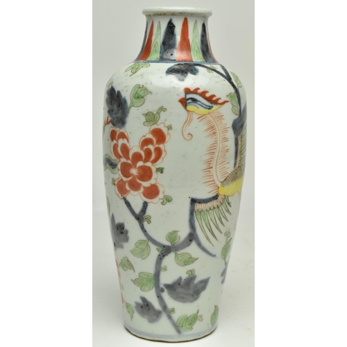 46 - An 18th century Chinese Qing dynasty ceramic wucai phoenix and peony baluster vase. The baluster vas... 