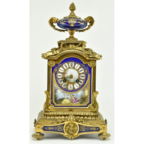 49 - A French 19th century Japy Freres, Paris gilt metal & enamel mantle clock. The clock having a hand p... 