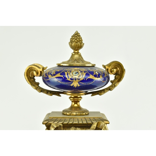 49 - A French 19th century Japy Freres, Paris gilt metal & enamel mantle clock. The clock having a hand p... 