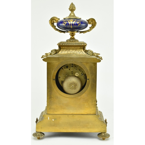 49 - A French 19th century Japy Freres, Paris gilt metal & enamel mantle clock. The clock having a hand p... 