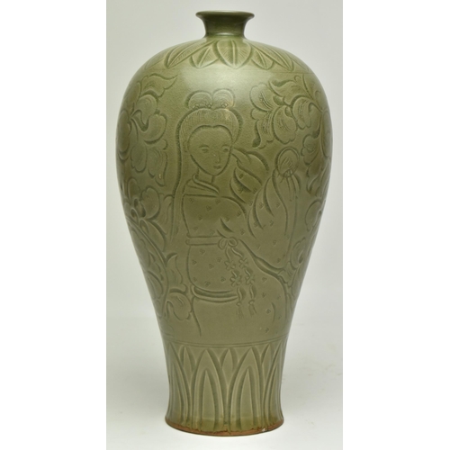 60 - A Chinese early Ming Dynasty Yaozhou stoneware glazed meiping baluster celadon vase. The vase decora... 