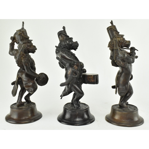 7 - A set of three French 19th century bronze figures of monkeys as soldiers in a band. The set comprisi... 