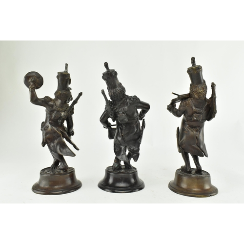 7 - A set of three French 19th century bronze figures of monkeys as soldiers in a band. The set comprisi... 