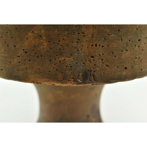 81 - A 19th century beech hat block on stand used in millinery. The hat block inscribed 66063/4 to front ... 