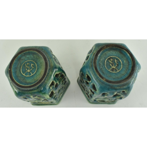 90 - A pair of Chinese Tang dynasty blue glazed hexagonal double layer open work pots. Each pot with carv... 