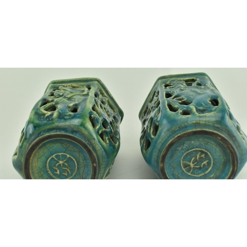 90 - A pair of Chinese Tang dynasty blue glazed hexagonal double layer open work pots. Each pot with carv... 