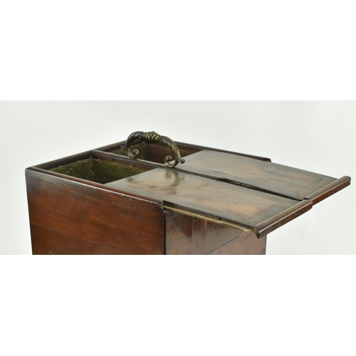 93 - A 19th century George III mahogany campaign decanter box. The box of square upright form with brass ... 