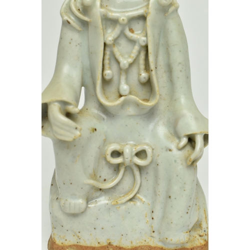 98 - A Chinese Ming dynasty Longquan celadon figure of Guanyin. Depicting Guanyin adorned in an elaborate... 