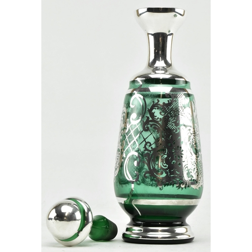 99 - A set of Venetian emerald glass decanter and glasses with silver overlay. Comprises a decanter with ... 