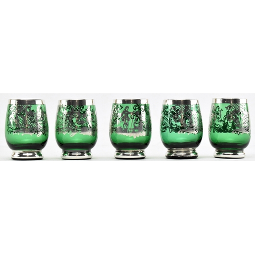 99 - A set of Venetian emerald glass decanter and glasses with silver overlay. Comprises a decanter with ... 