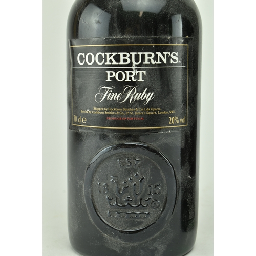 242 - Two vintage Portuguese Cockburn's Port / Porto bottles. The lot to include a circa 1970s/80s Cockbur... 