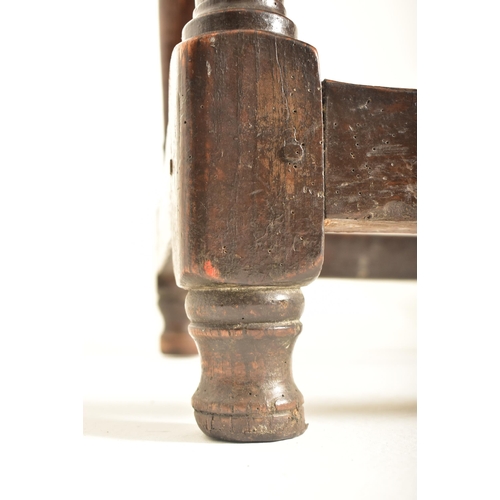 259 - A 17th century oak commonwealth refectory dining table. The table having a rectangular straight top ... 